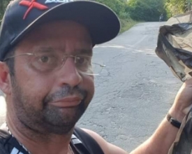 Veranista cata lixo na estrada e dá lição de moral